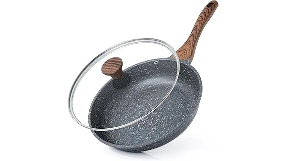 The image shows a perfect fried egg sliding effortlessly from a nonstick skillet, highlighting best nonstick cookware for eggs.