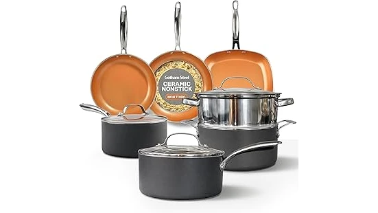 The image shows a collection of diverse frying pans and pots, suggesting a comprehensive cookware set.