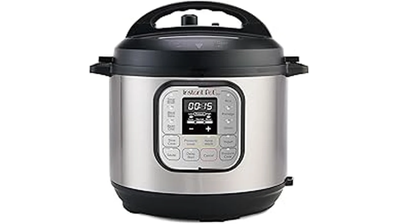 The image shows a gleaming silver electric cooker, a key component for any kitchen's Best 16 Cooker Electric lineup.