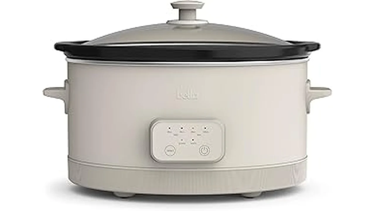 This image shows a modern kitchen counter displaying several sleek slow cookers, perfect for the best 22 slow cooker with timer selection.