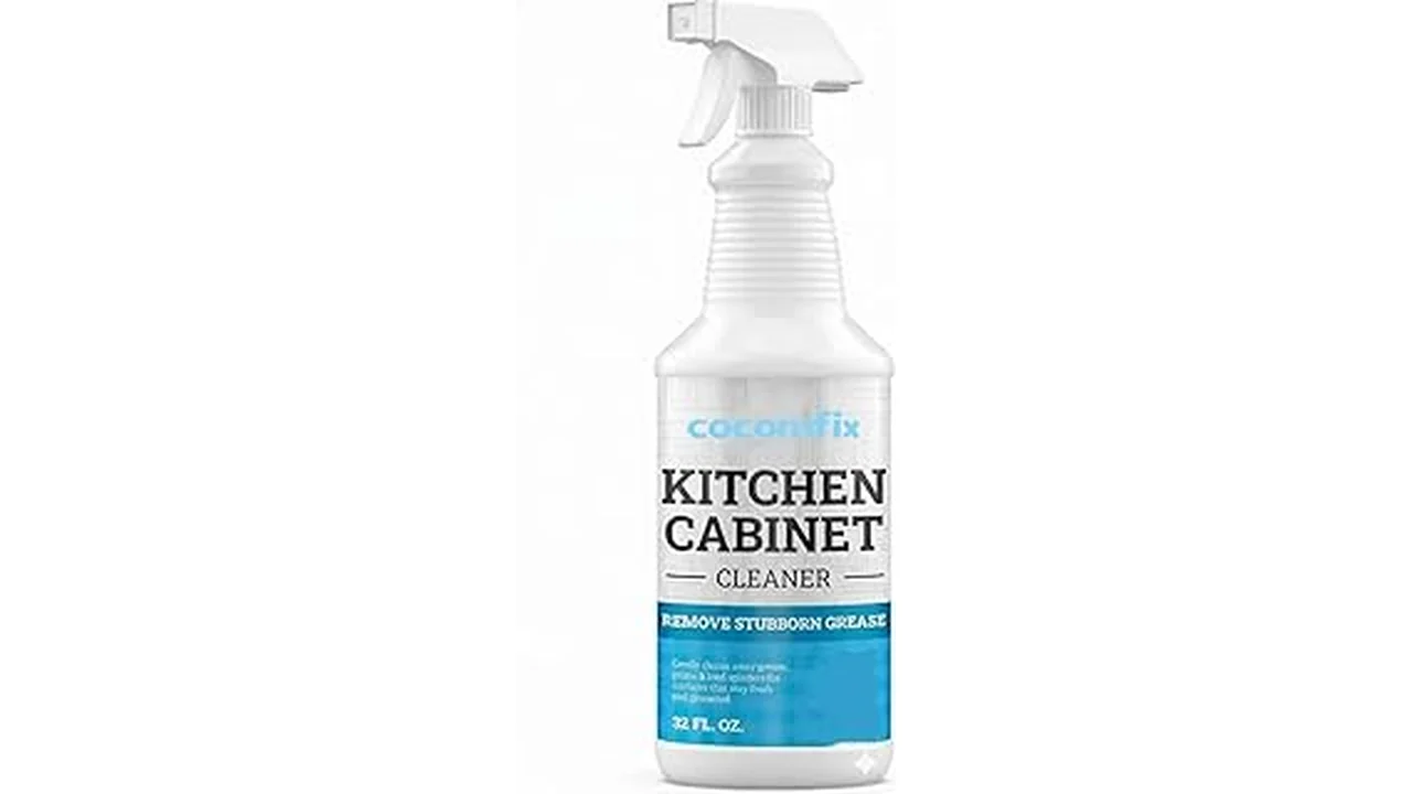 The image shows sparkling clean white kitchen cabinets, highlighting effective cabinet cleaning solutions.