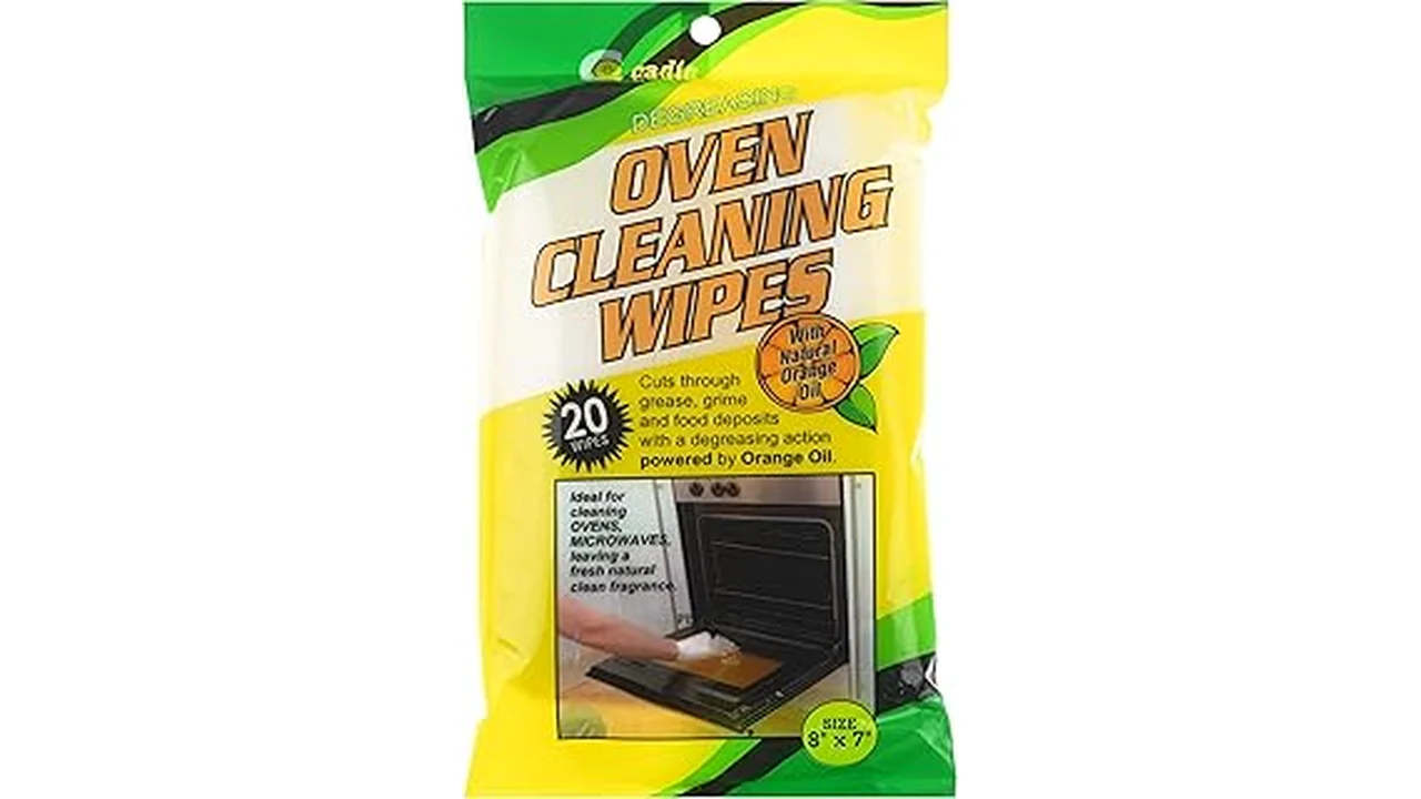 The image shows a sparkling clean oven door, highlighting the effectiveness of Best 31 Oven Door Cleaner.